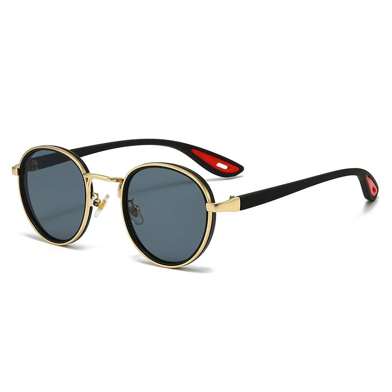Vintage-inspired round sunglasses with gold frames and grey tinted lenses