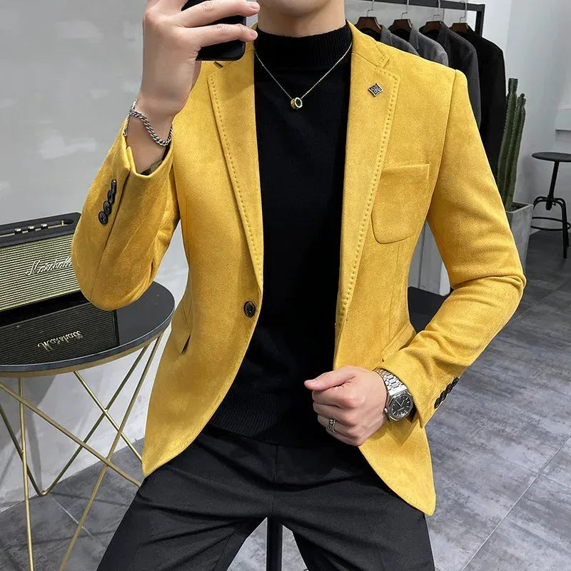 Person wearing a yellow blazer in an indoor setting