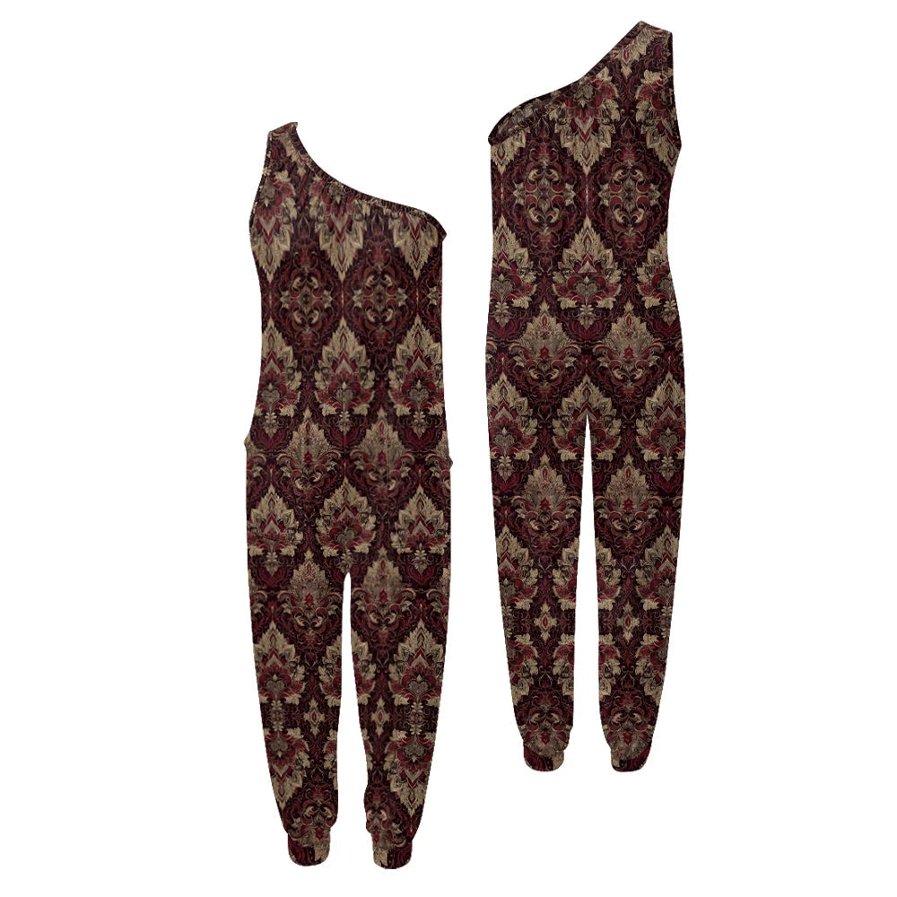 Patterned one-shoulder jumpsuit on a white background.