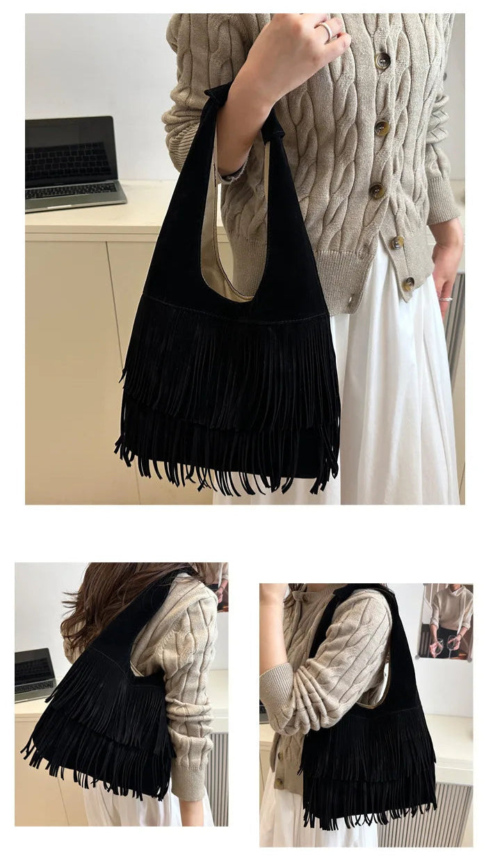 Black fringe bag held by a person in a casual setting