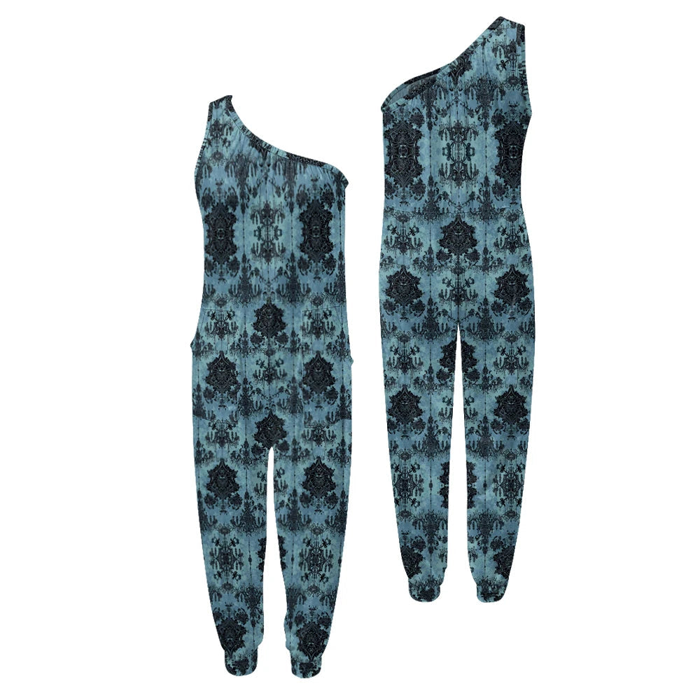 Blue patterned one-shoulder jumpsuit on a white background.