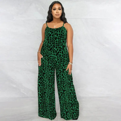 Woman wearing a green leopard print jumpsuit against a white background