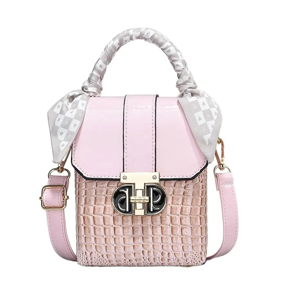 Pink handbag with a checkered handle on a white background