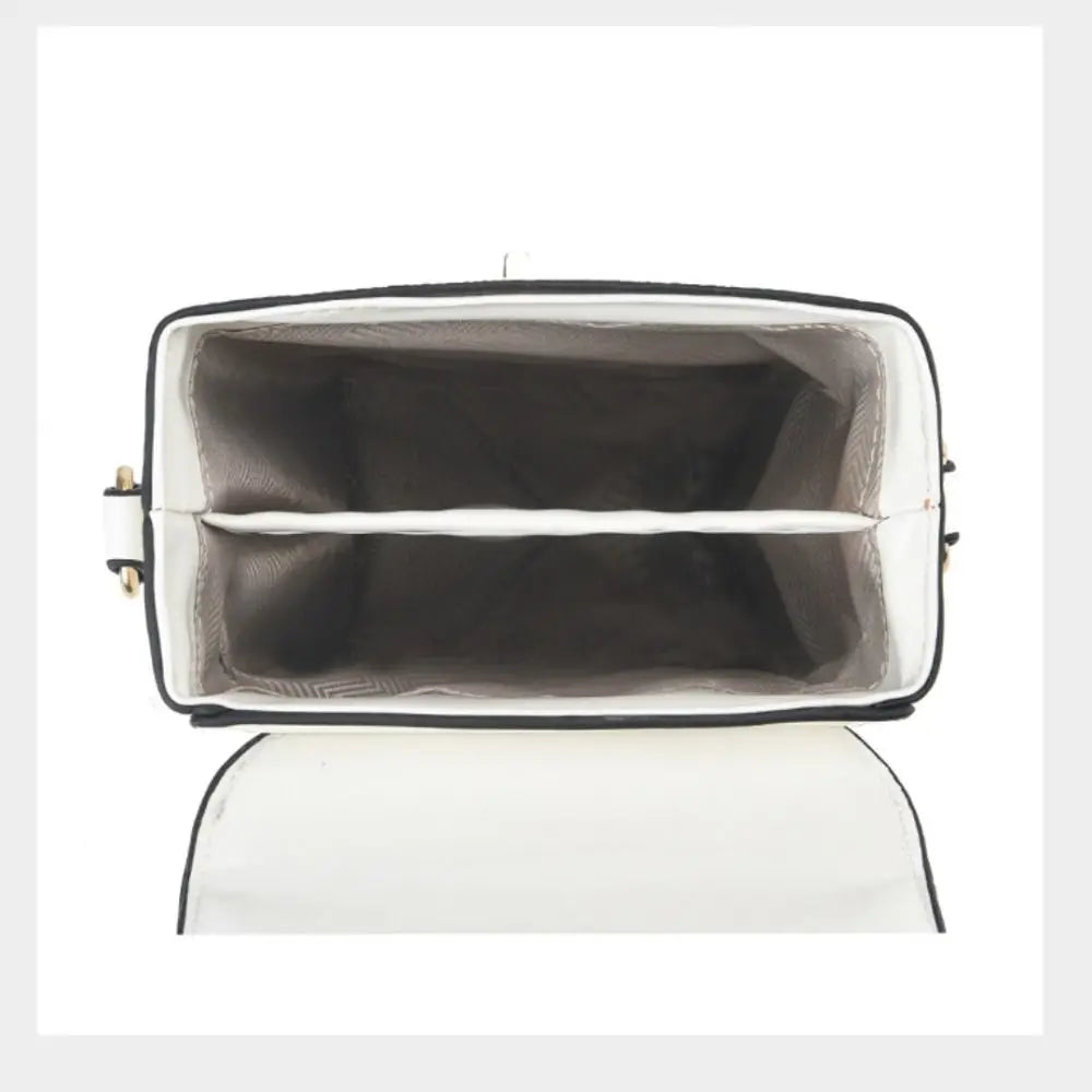 White handbag with a black interior on a white background