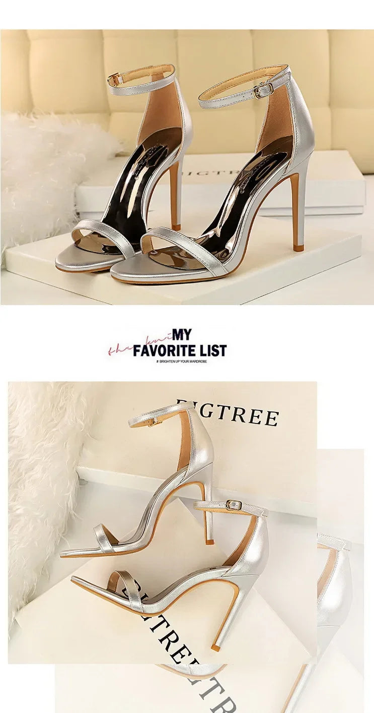 Silver high-heeled sandals on a white surface with 'My Favorite List' branding.