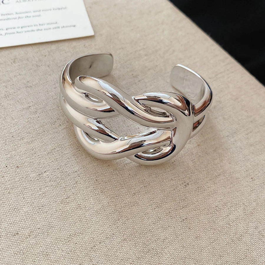 Silver bracelet on a textured surface