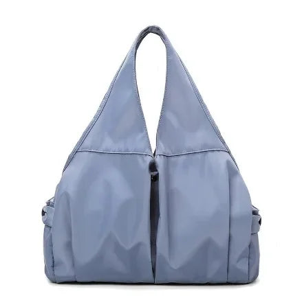 Light blue shoulder bag on a white background