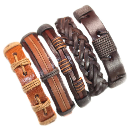 Set of leather bracelets in various designs on a white background