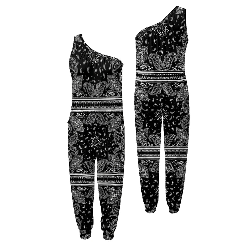 Black and white patterned one-shoulder top and pants set on a white background.