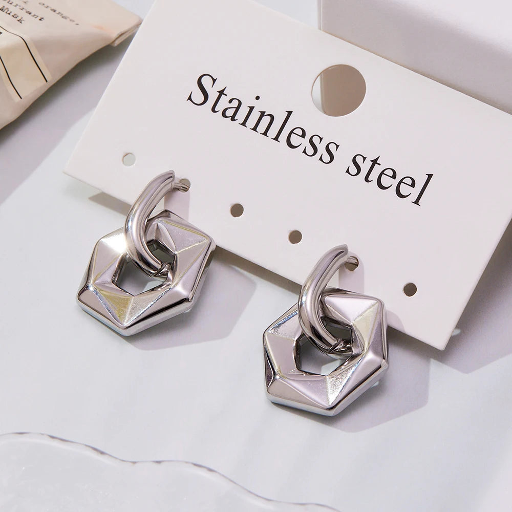 Stainless steel earrings on a white card with 'Stainless steel' text