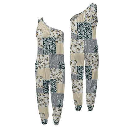 Floral patchwork one-shoulder jumpsuit on a white background.