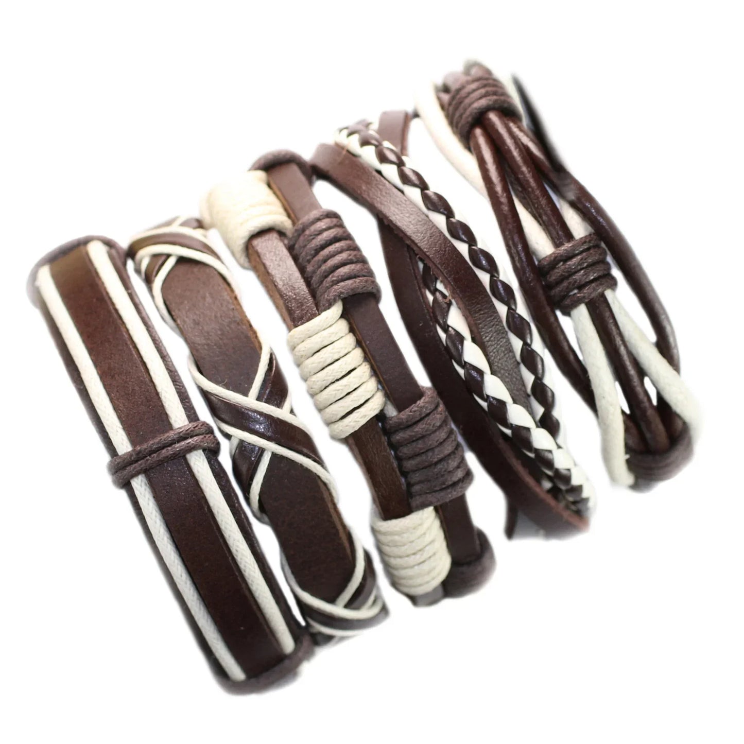 Set of brown and white leather bracelets on a white background