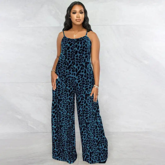 Woman wearing a blue leopard print jumpsuit against a white background