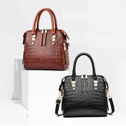 Two handbags, one brown and one black, on a white background with 'NEW PRODUCT' text.