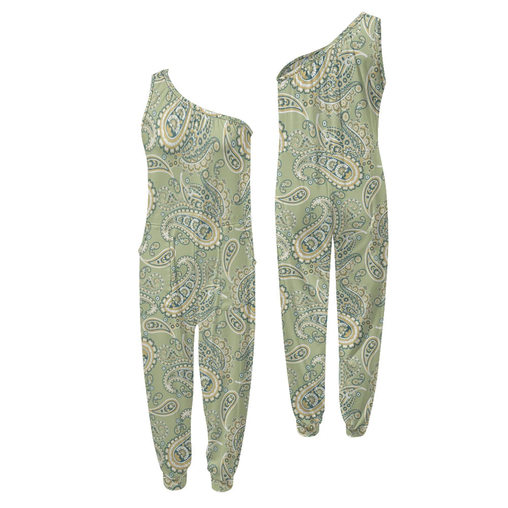 Green paisley patterned one-shoulder jumpsuit on a white background.