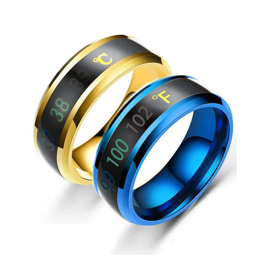 Two digital temperature rings, one gold and one blue, on a white background.