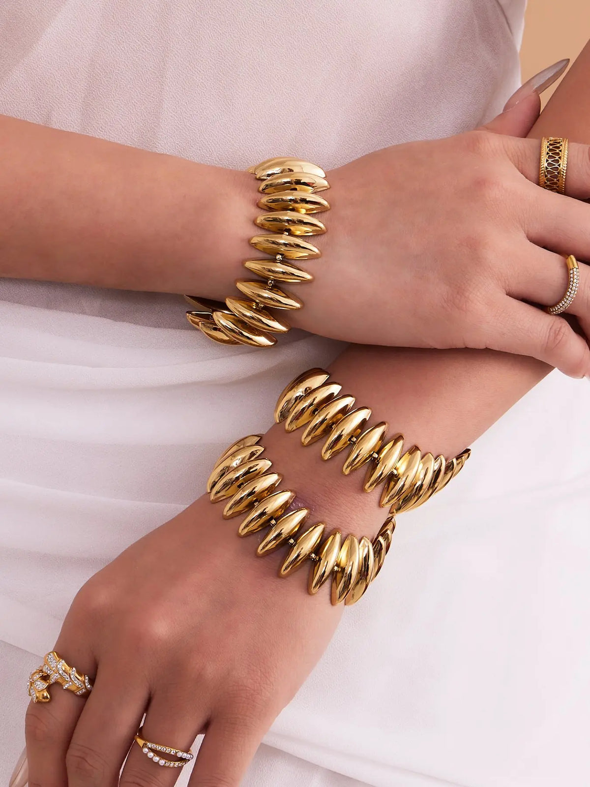 Sculptural Gold Beaded Jewelry Collection