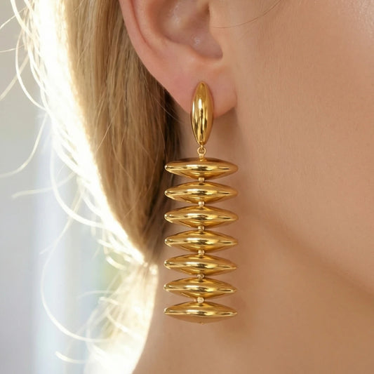 Sculptural Gold Beaded Jewelry Collection
