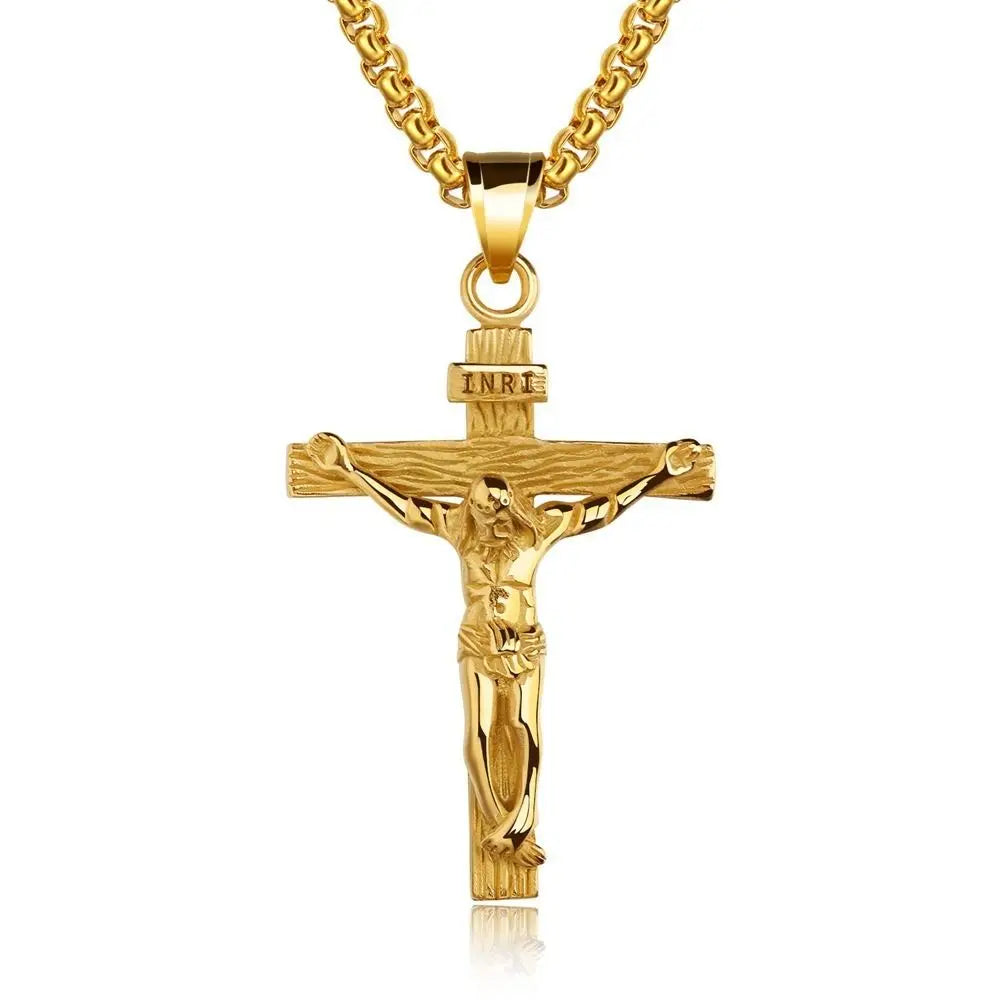 Gold crucifix pendant on a white background