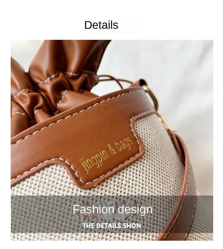 Close-up of a brown leather bag with 'jingpin & bags' label on a light gray background