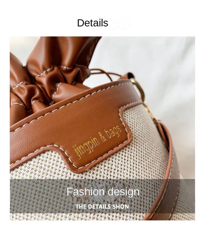 Close-up of a brown leather bag with 'jingpin & bags' label on a light gray background