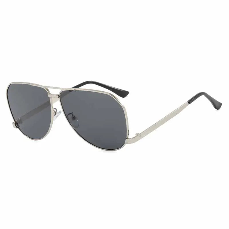 Sunglasses with silver frame and dark lenses on a white background