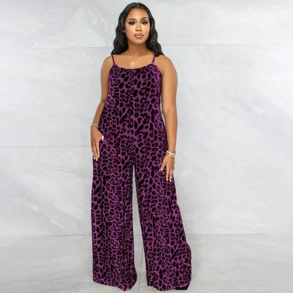 Woman wearing a purple leopard print jumpsuit against a white background