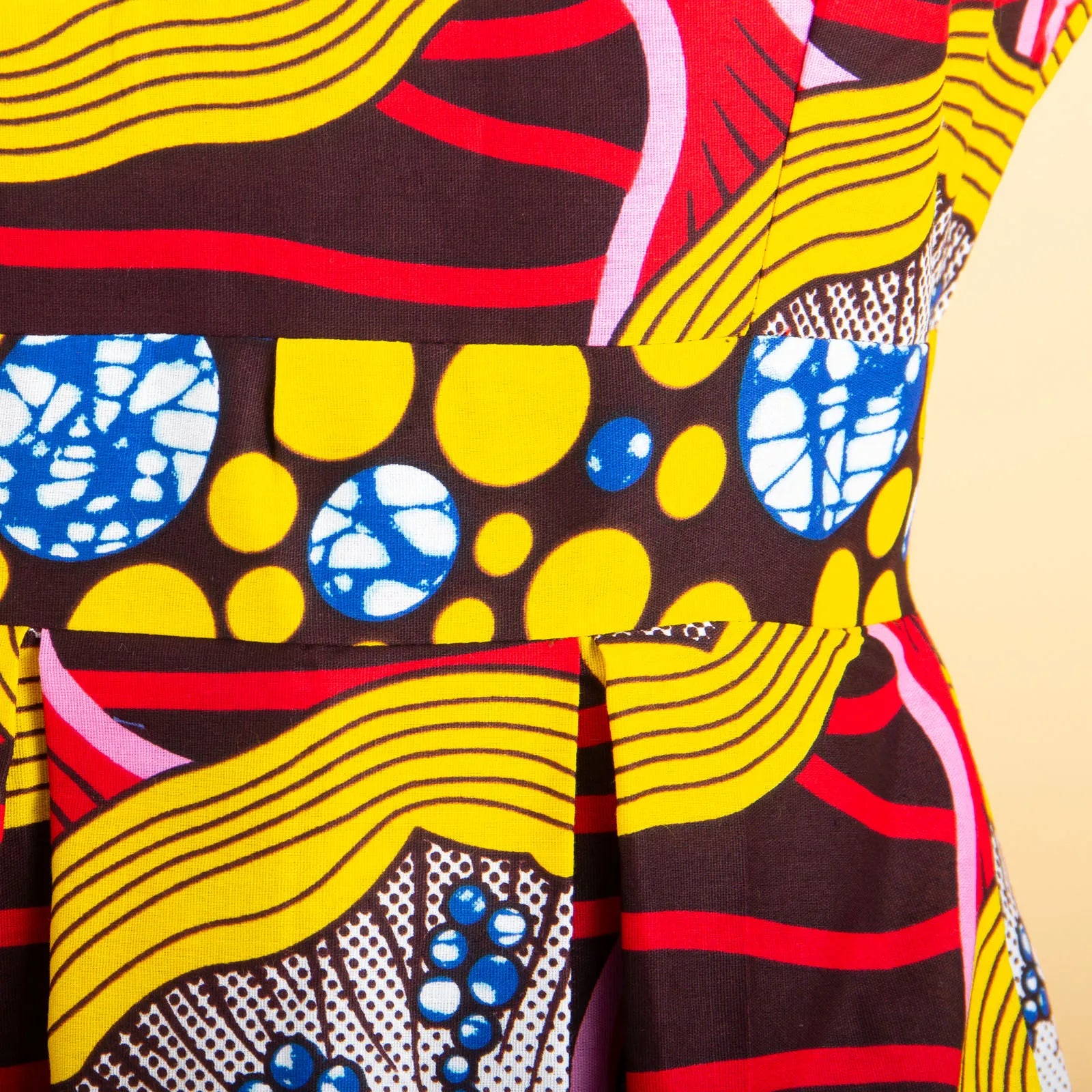 Bold African patterns on sleeveless dress