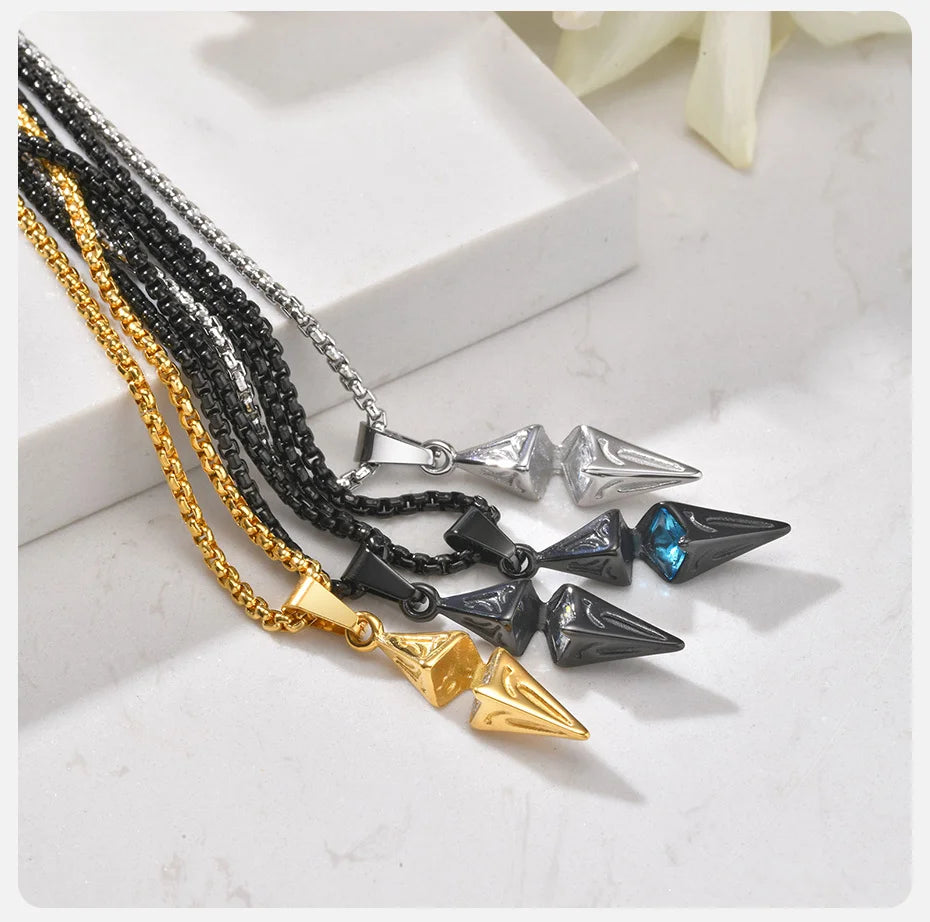 Four colour variants of men's arrow necklace: black blue, black white CZ, silver, gold