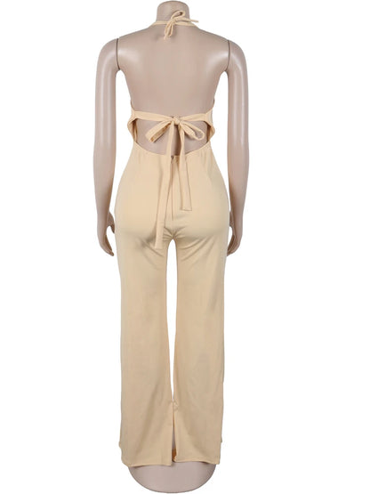 Detail of ruched halter with gold beads on champagne fabric