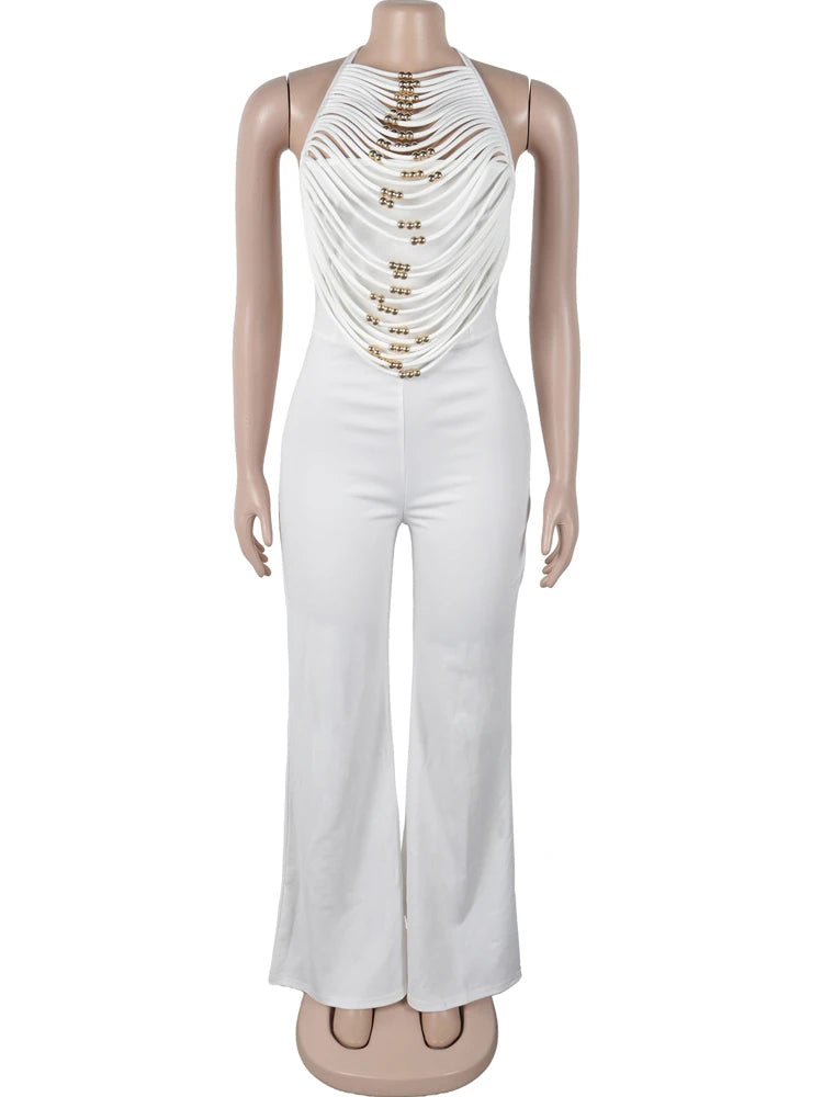 White backless jumpsuit, side angle showing palazzo leg