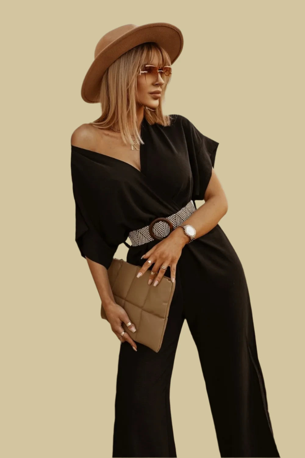 Black modest jumpsuit styled for formal wear