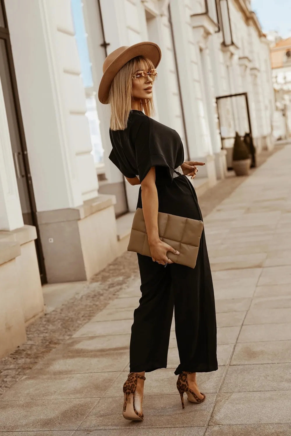 Black modest jumpsuit styled for formal wear