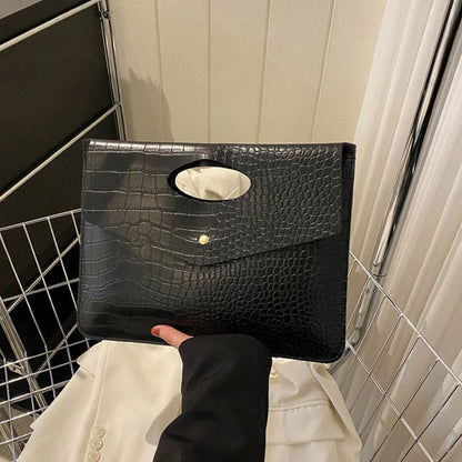 Black Bold Envelope Evening Clutch with crocodile-textured PU exterior, flap and cutout handle.