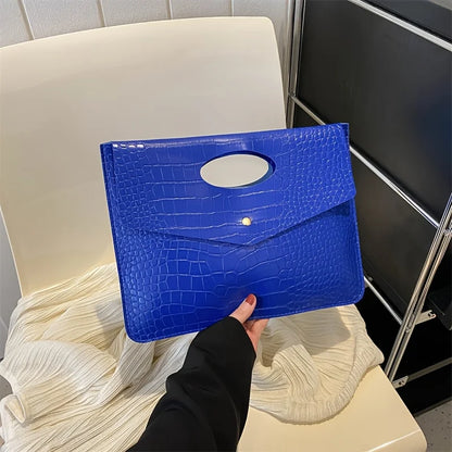 Blue Bold Envelope Evening Clutch featuring a crocodile-textured PU exterior and oval cutout handle.