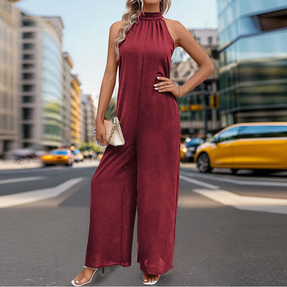 Elegant sleeveless jumpsuit for women in burgundy with halter neckline.