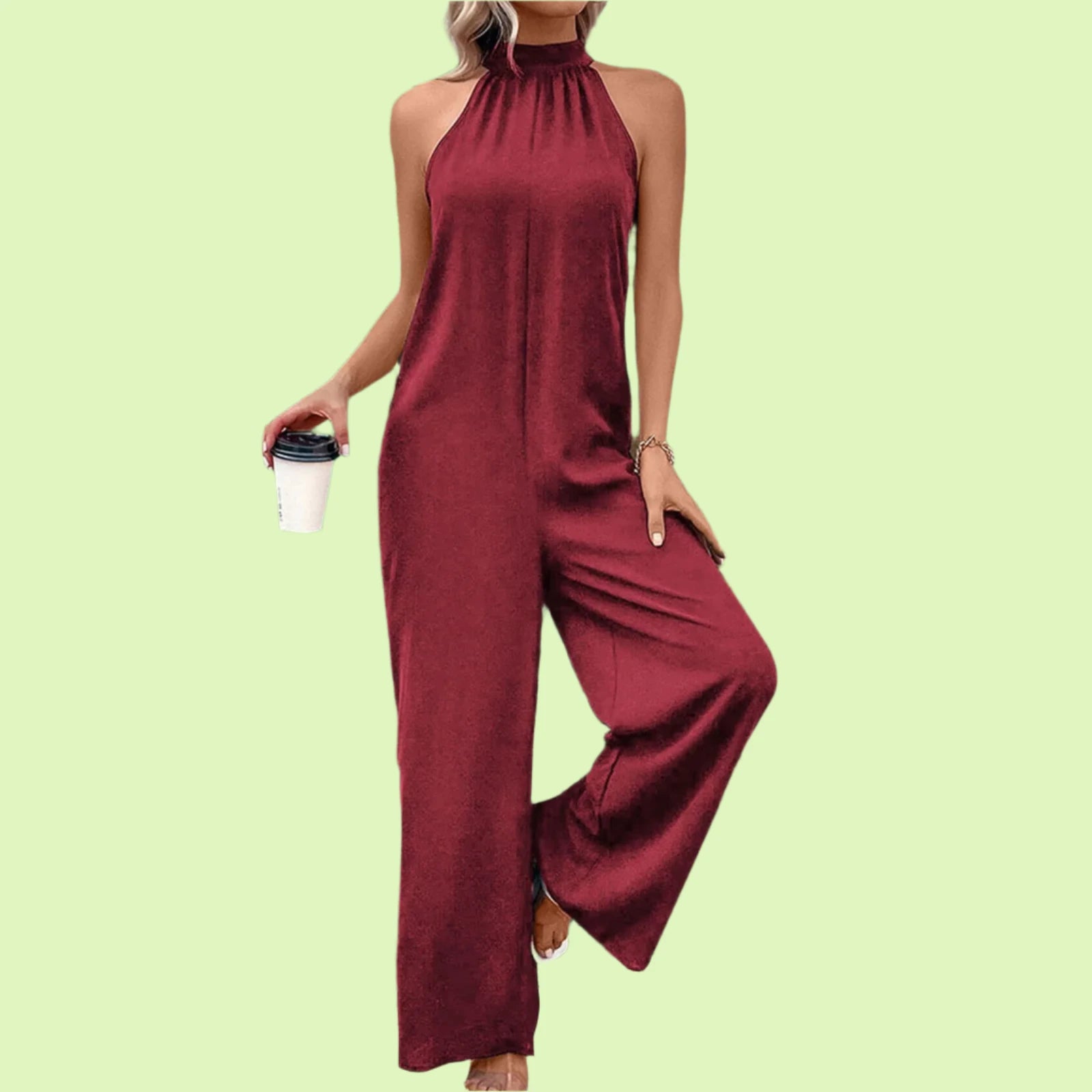 Elegant sleeveless jumpsuit for women in burgundy with halter neckline.