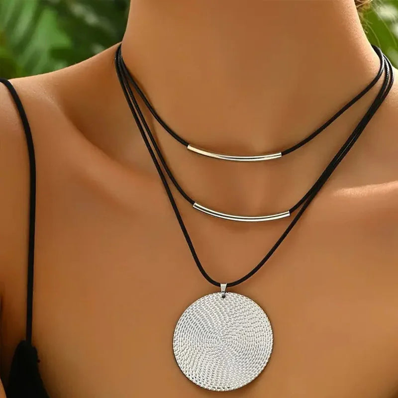 Genuine leather necklace in brown with gold color accents for earthy elegant style