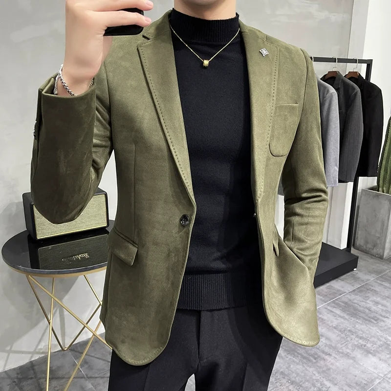 Green men’s sport blazer paired with a black turtleneck