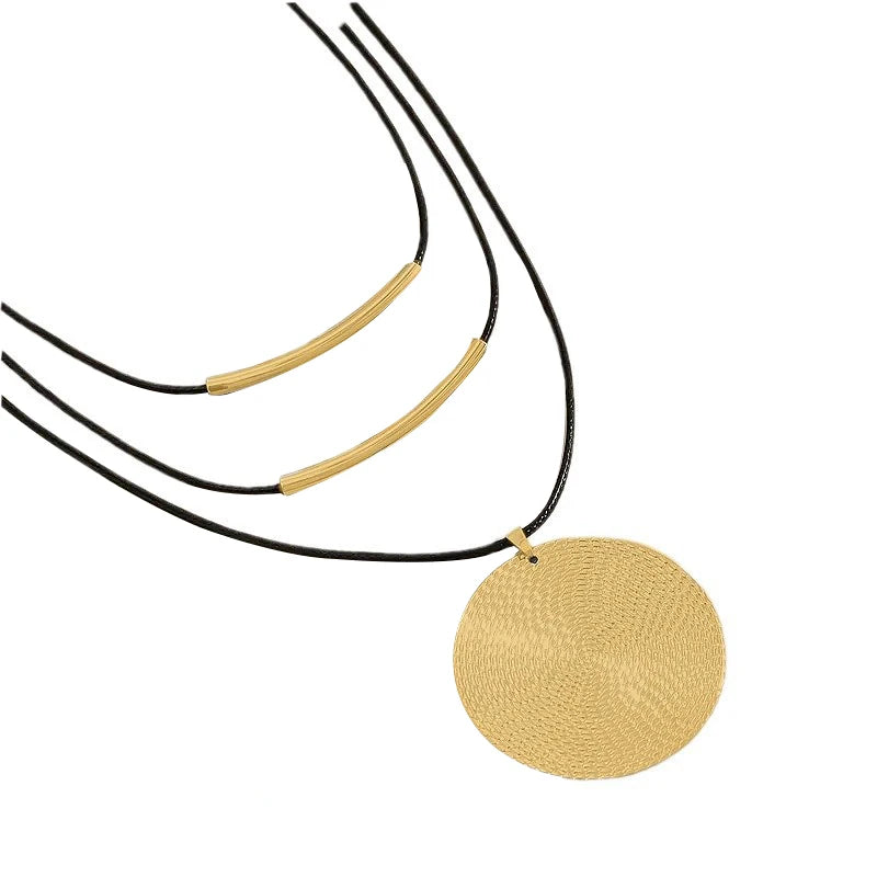Leather statement necklace styled with casual outfit showing versatile bohemian look