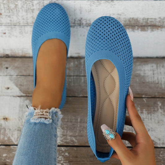 Blue lightweight loafers for women with breathable fabric.