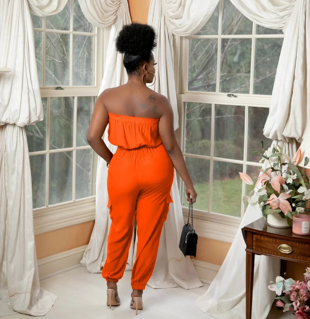 Woman wearing a chic off-shoulder strapless jumpsuit