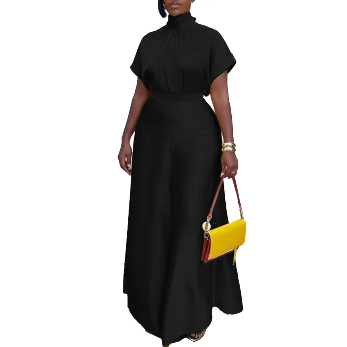 "Close-up detail of mock neck collar and belt on women's stretch fabric pantsuit"