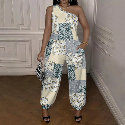 Woman wearing a floral patchwork jumpsuit in an elegant room.