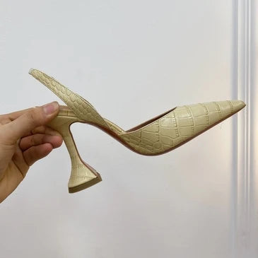 Elegant heels showing secure slingback closure for customized comfortable fit