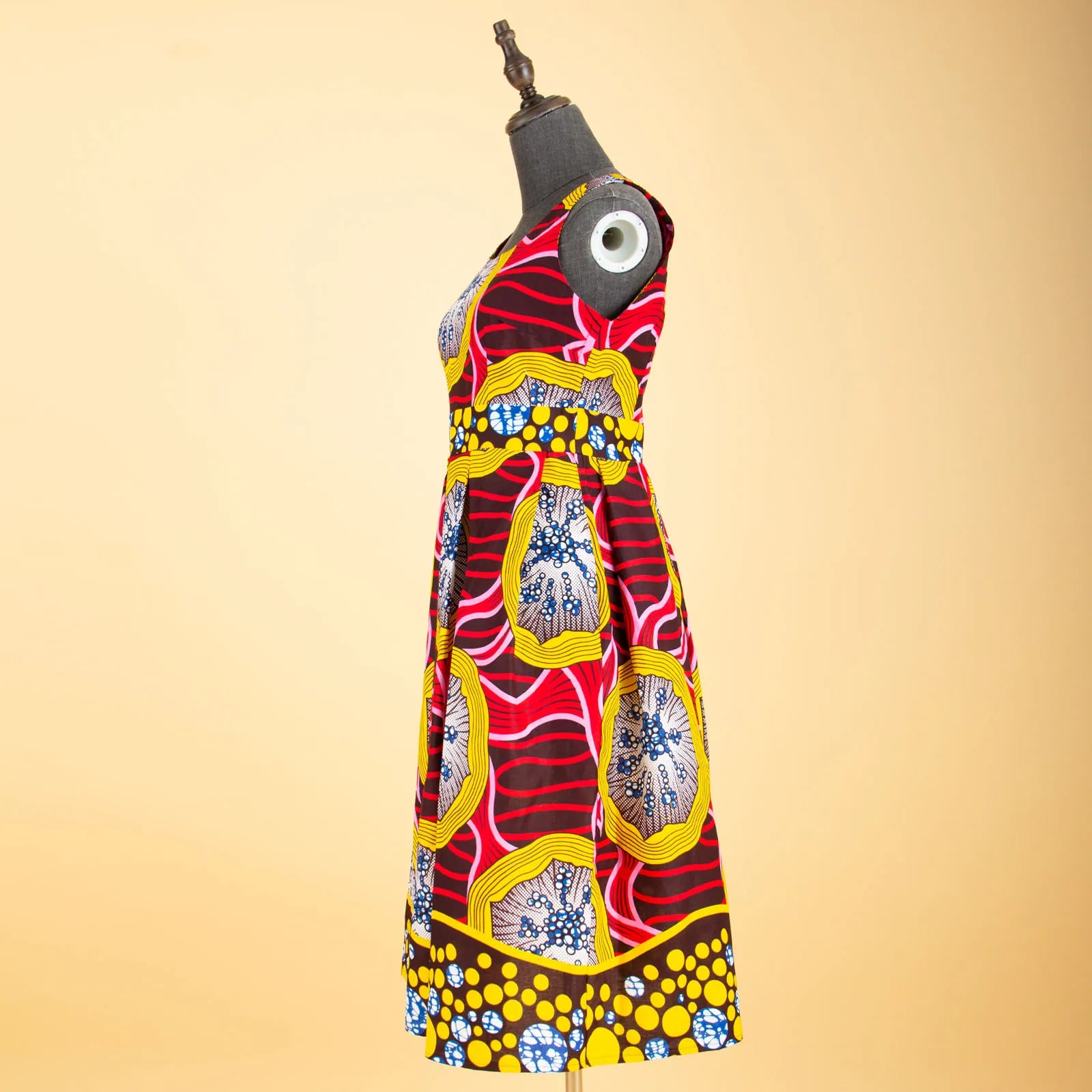 Sleeveless African print dress with bold patterns