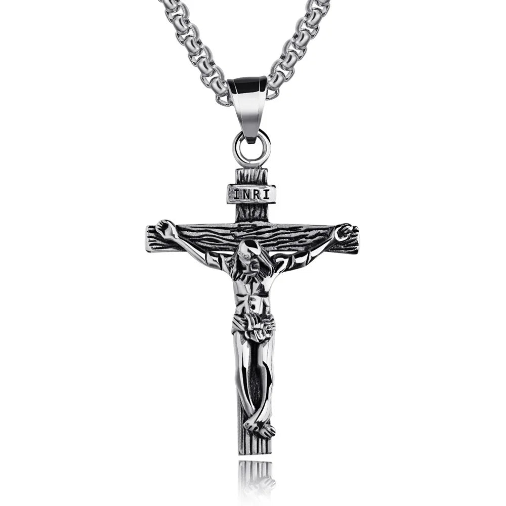 Silver crucifix pendant necklace showing tarnish-resistant stainless steel finish