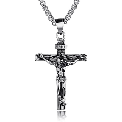 Silver crucifix pendant necklace showing tarnish-resistant stainless steel finish