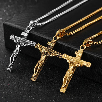 Stainless steel crucifix pendant necklace in gold, antique gold, and silver finishes
