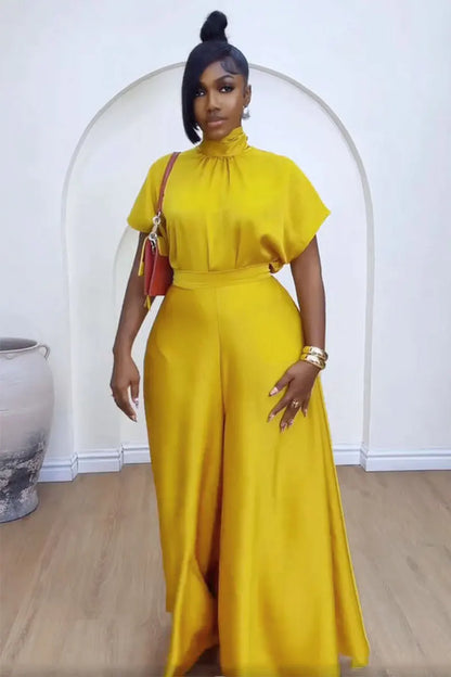 "Wide-leg pants hem detail showing professional finishing and flow"